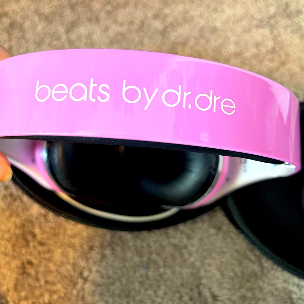 PINK Beats by Dre wireless headphones.